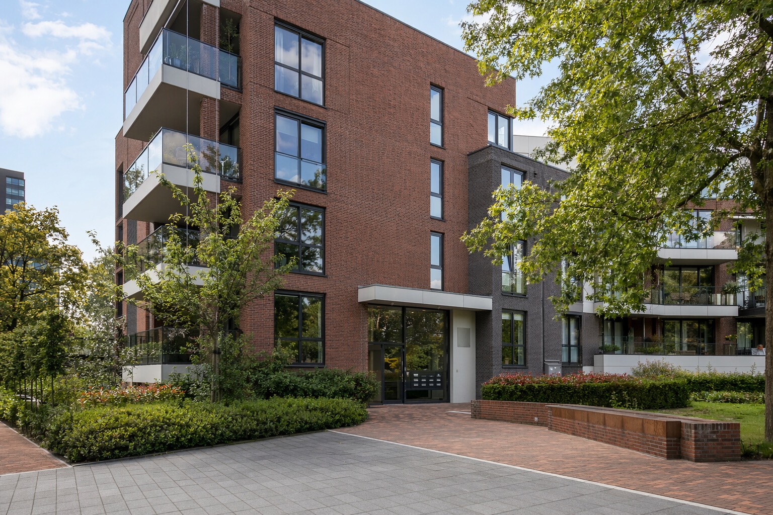 Apartment Valuation in Eindhoven 2 Apartment building with green courtyard prepared for a Dutch valuation review.