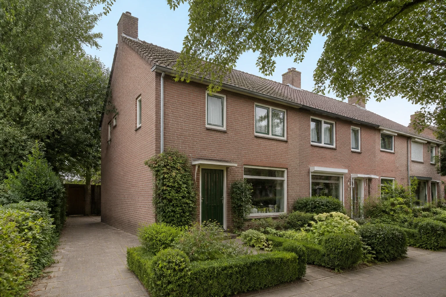 House Valuation in Heeze: Prices, Liveability & Outlook (2026) 5 Representative brick family home with garden in Heeze, used as housing-type context