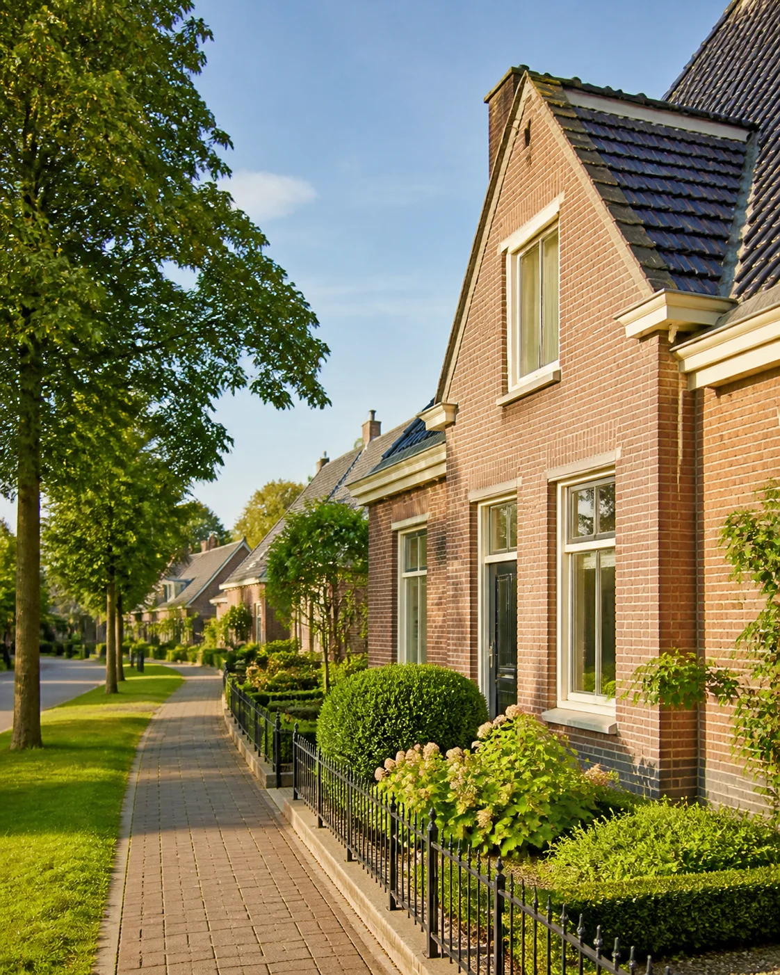 House Valuation in Someren 1 Someren historic village lane with brick homes, green edge and church tower, North Brabant