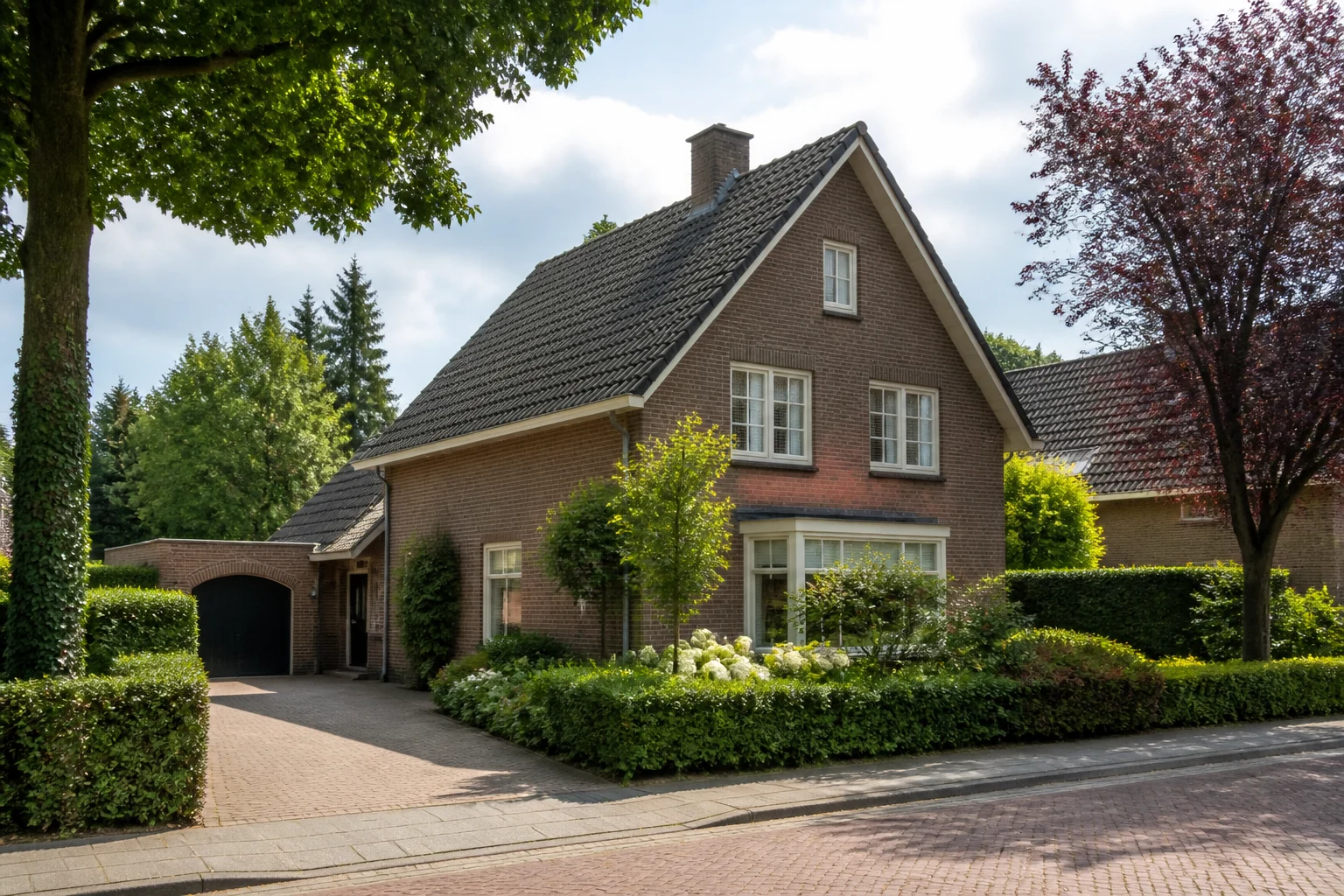 Representative detached Dutch family home with garden and driveway in Waalre